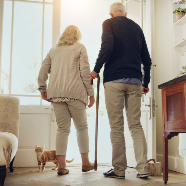 elderly couple in home together